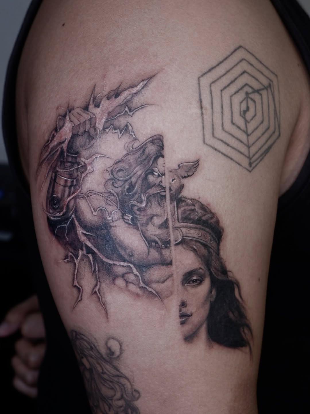 Zeus and Athena portrait blackwork tattoo